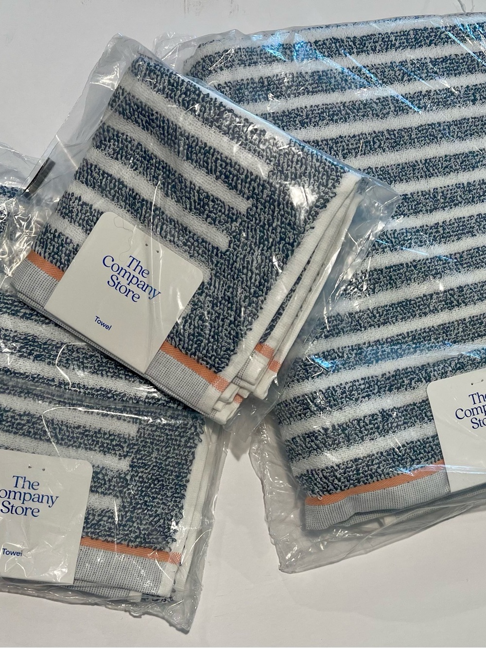 The Company Store 4 piece Navy & White Striped Towel set with Peach Accent